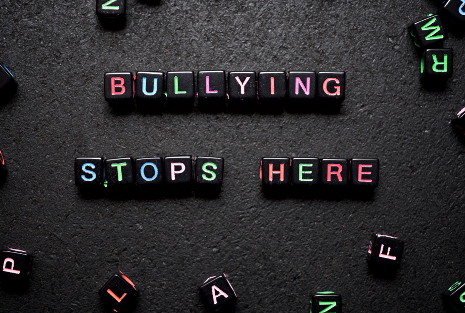 Letter cubes spelling out bullying stops here.