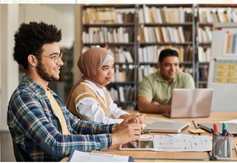 Adult students listening to a lesson.